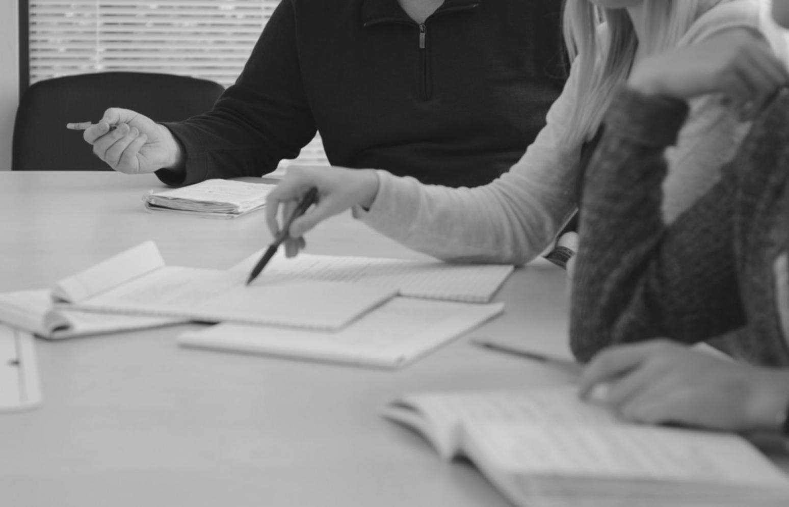 Group of students collaborating on financial planning project via video call